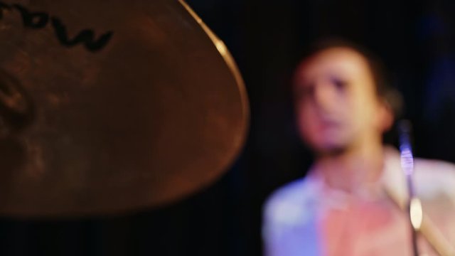 Low angle view of a drummer playing the cymbals