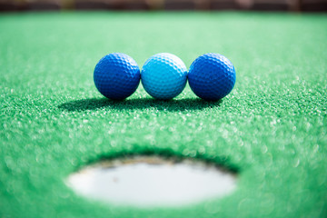 Mini Golf  Balls and Clubs