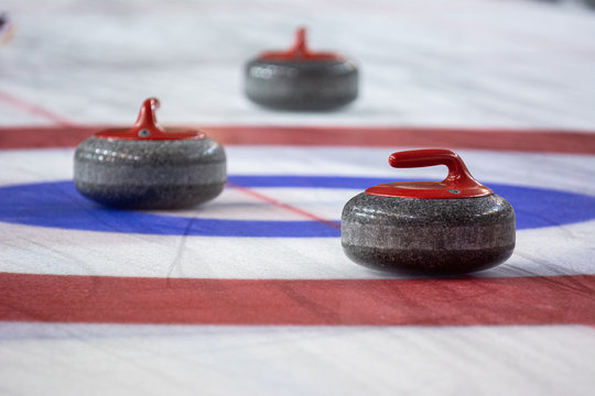 Curling Rock On The Ice