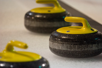 Curling rock on the ice