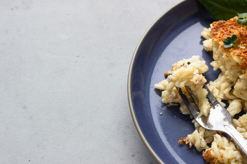 Mac and cheese, American style macaroni pasta with cheesy bechamel sauce and crunchy breadcrumbs topping. Pasta and cheese casserole.