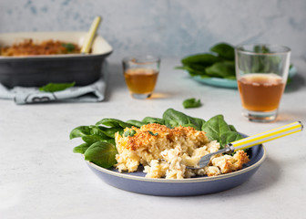 Mac and cheese, American style macaroni pasta with cheesy bechamel sauce and crunchy breadcrumbs topping. Pasta and cheese casserole.