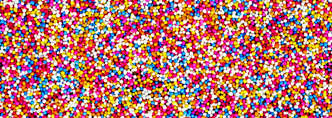 Fun, multicolor abstract of cake toppings, 100's and 1000's - candy banner / panorama / header for...