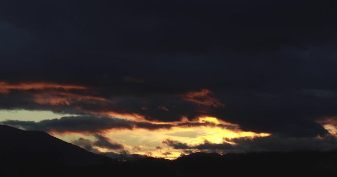 sunset in the mountains with clouds near Málaga, Spain