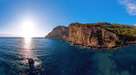 Sunset in mediterranean lagoon in Greece