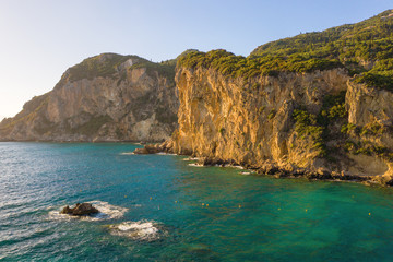 Fototapeta premium Beautiful cliffs near sea or ocean during sunset