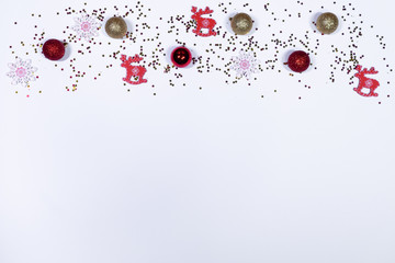 Christmas composition, christmas toys on white background, top view, flat lay
