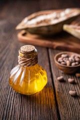 Baobab seed oil in glass bottle for healthy skin and hair