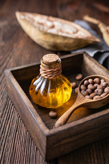 Baobab seed oil in glass bottle for healthy skin and hair