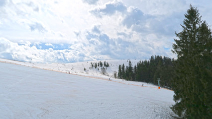 Fototapeta premium wonderful snowy mountain landscape in early spring