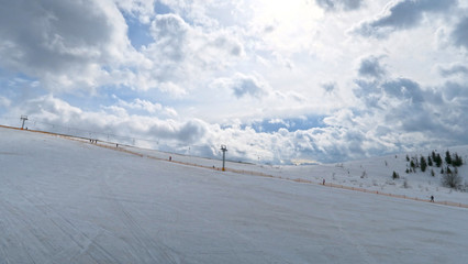 wonderful snowy mountain landscape in early spring