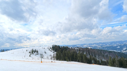 Fototapeta na wymiar wonderful snowy mountain landscape in early spring