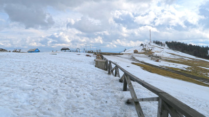 wonderful snowy mountain landscape in early spring