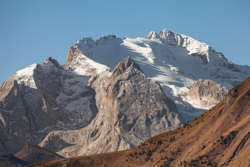Marmolada mount is the highest peak in the Italian Dolomites with its characteristic perennial glacier on the northern face - obrazy, fototapety, plakaty