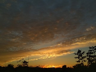colorful dramatic sky with cloud at sunset