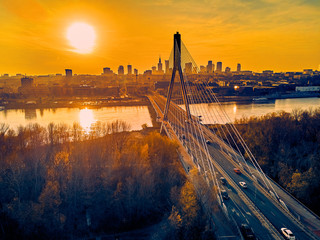 Beautiful panoramic aerial drone sunset view to Warsaw city center with skyscrapers and...