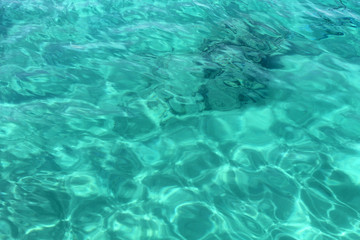 blue water in swimming pool background