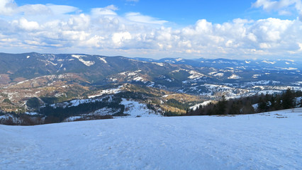 wonderful snowy mountain landscape in early spring