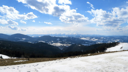 Fototapeta na wymiar wonderful snowy mountain landscape in early spring