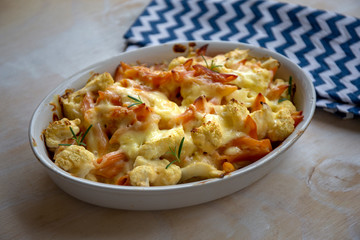 Cheese bakded cauliflower and red lentils spirals