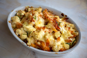 Cheese bakded cauliflower and red lentils spirals