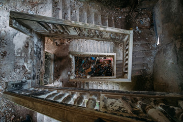 Broken ruined old staircase at abandoned house © Mulderphoto