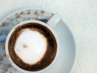 cup of cappuccino coffee, top view