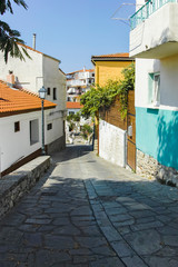 Typical street and houses at old town of city of Kavala, Greece