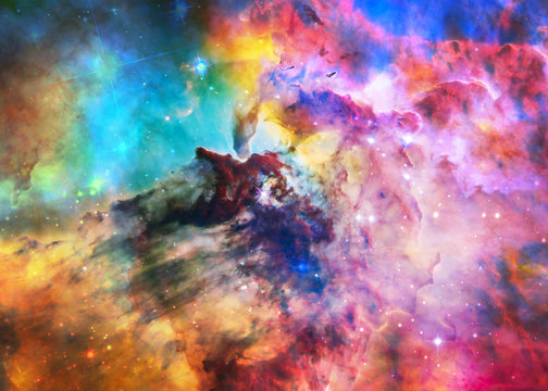 The Lagoon Nebula in bright colours. Deep space look. Science fiction wallpaper. Elements of this image were furnished by NASA.