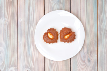 two cupcakes hearts on a plate
