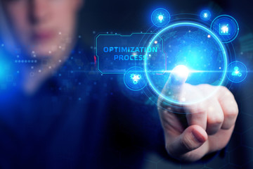 Planning marketing strategy. Business, Technology, Internet and network concept. Young businessman shows the word: Optimization process