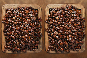 Roasted coffee beans in wooden boxes