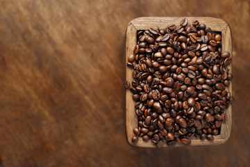 Coffee beans in a wooden box 