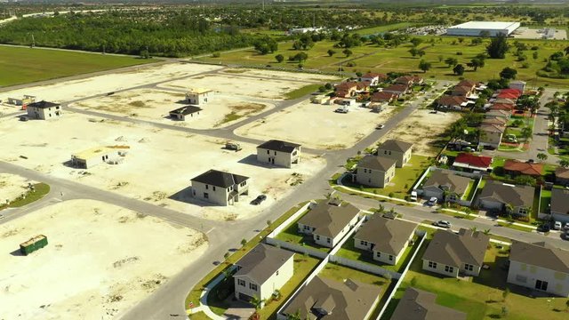 Aerial panorama of homes being completed in stages neighborhood Miami Homestead FL