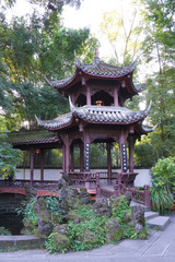 Du Fu thatched Cottage park in honor of Du Fu, one of the famous Tang Dynasty poets, Sichuan, China.The cottage filled with Du fu's poems, bonsai and the oriental element.