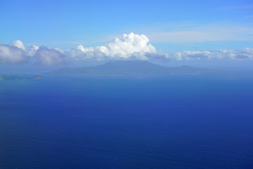 Fototapeta premium Aerial view of the Nevis Peak volcano in St Kitts and Nevis