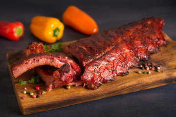 Pork loin ribs served on chopping board