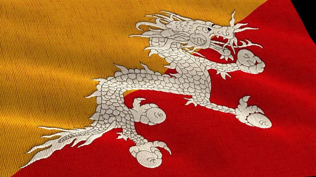 Bhutan flag flying in the wind close-up