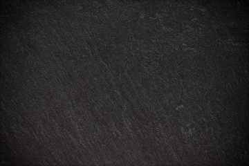 Dark grey black slate background or texture.