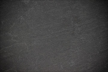 Dark grey black slate background or texture.