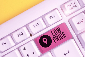 Writing note showing Low Price. Business concept for Price are the lowest in relation to other...
