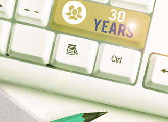 Writing note showing 30 Years. Business concept for Remembering or honoring special day for being...