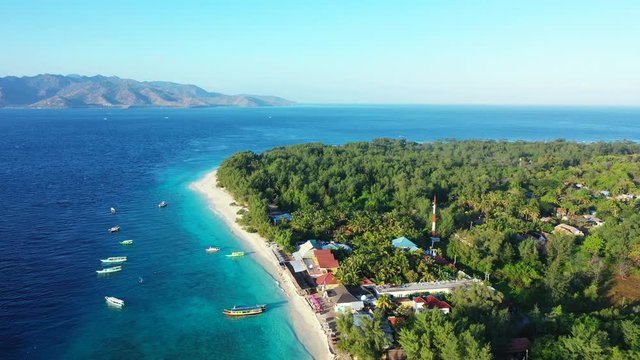 Vanuatu Island - The Vast Ocean Waters And Lush Of Green Islands And A Beautiful White Sand Beach Resorts On A Sunny Day - Aerial Shot