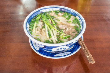 Vietnamese Rice Noodle (Pho Bo) Bowl and Chopsticks