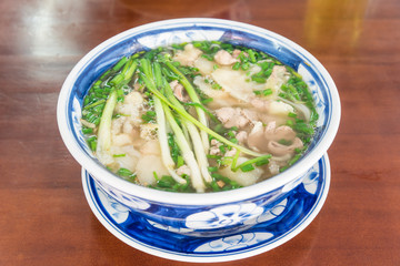 Authentic Vietnamese Rice Noodle (Pho Bo) Bowl with green onions