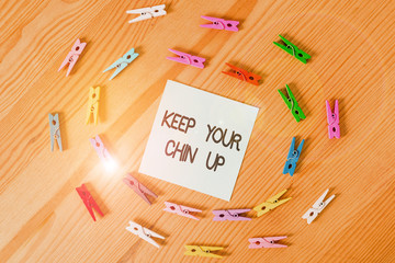 Writing note showing Keep Your Chin Up. Business concept for Remain cheerful in difficult...