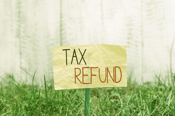 Handwriting text writing Tax Refund. Conceptual photo refund on tax when the tax liability is less...
