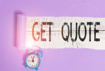 Word writing text Get Quote. Business photo showcasing the most recent price to which a buyer and seller agreed Alarm clock and torn cardboard placed above a wooden classic table backdrop © A