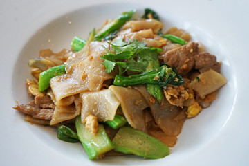 Pad See Ew, Stir fried noodles with black soy sauce and pork