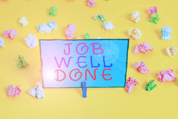 Text sign showing Job Well Done. Business photo showcasing Well Performed You did it Cheers Approval Par Accomplished Colored crumpled papers empty reminder white floor background clothespin